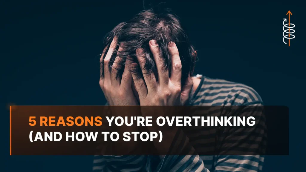 Stressed man with hands on his head showing 5 reasons you're overthinking and how to stop